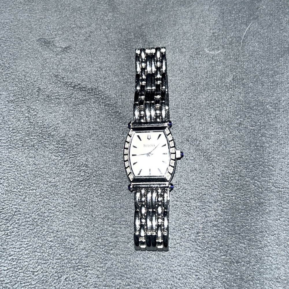 Beautiful Bulova silver watch with diamond accent. In perfect condition!!